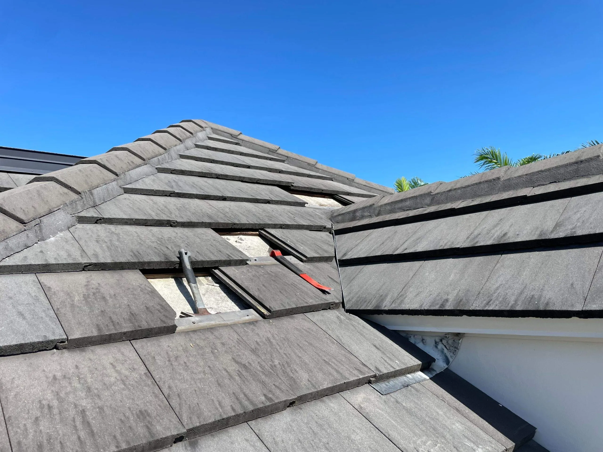 pieces of tile removed from roof for a repair, concrete roof tiles