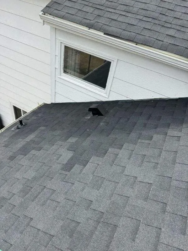 after shot once shingle tiles are repaired on roof