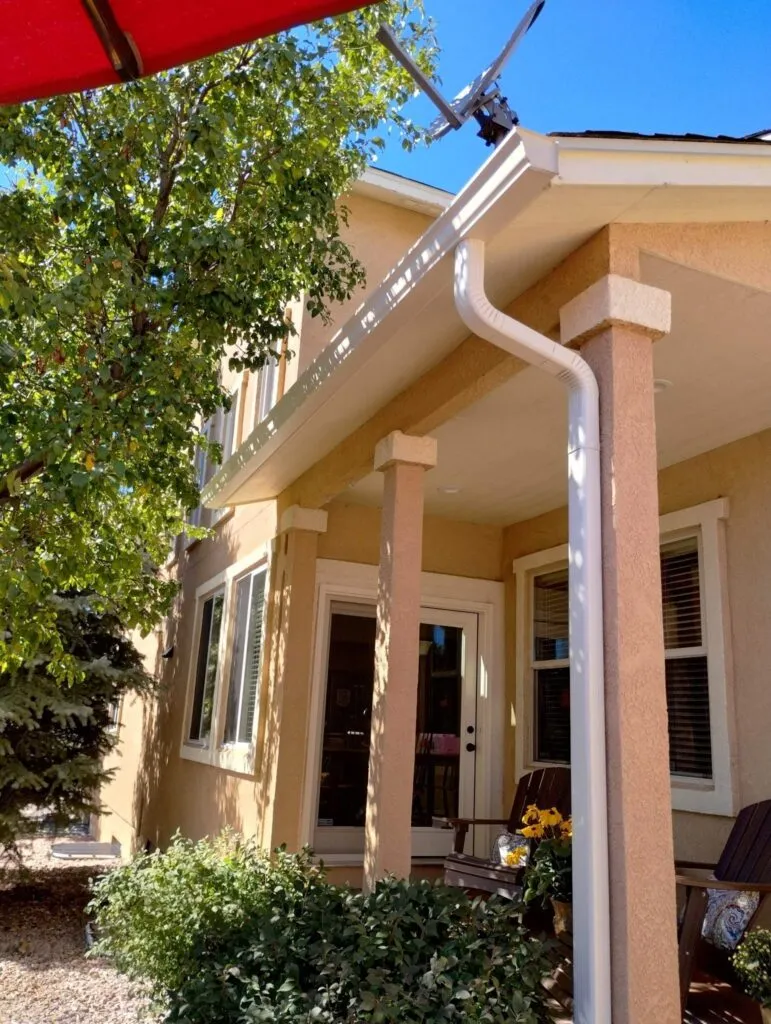white gutters and downspouts on colorado home