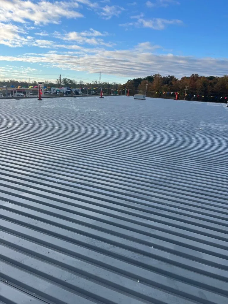 roof on commercial building after replacement, new standing seam metal roof